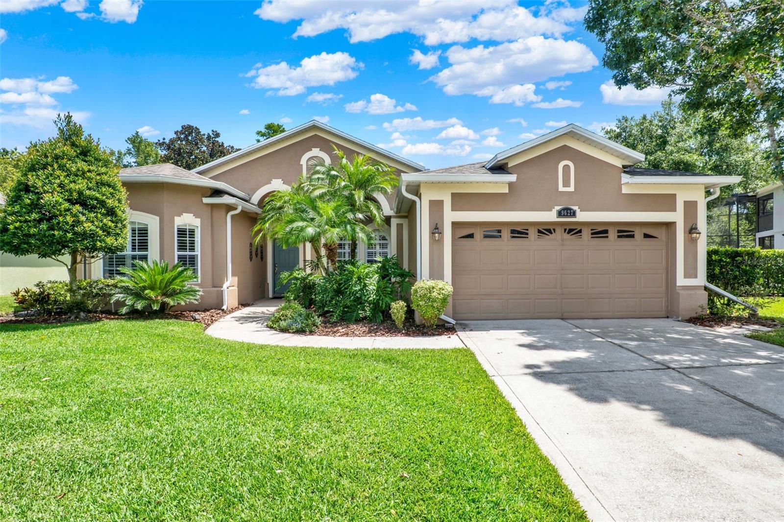 Luxury Pool Home in Gated North Shore at Lake Hart; Conservation Lot on a Cul-de-Sac!
Experience the best of Central Florida living in this beautifully upgraded 4-bedroom, 2-bath home, ideally located on a quiet cul-de-sac in the sought-after gated golf community of North Shore at Lake Hart. Set on a .25-acre conservation lot, this home offers both privacy and peaceful natural views, along with exceptional indoor and outdoor living spaces. Inside, the home features engineered hardwood floors and surround sound throughout the living areas, creating a warm and inviting atmosphere. The gourmet kitchen is designed with entertaining in mind and includes a large center island, stainless steel appliances, Corian countertops, 42-inch cabinets, and generous workspace for any home chef. Built-in closets offer elegant and efficient storage solutions in key areas of the home. The primary suite provides a serene retreat with views of the conservation area and pool, and includes a spacious en-suite bath with dual vanities, soaking tub, and separate shower. Three additional bedrooms offer flexibility for guests, a home office, or hobby space. Step outside to your private backyard oasis, where a heated saltwater pool and spa (installed in 2021) invite you to relax and unwind. The paver patio and screened lanai offer the perfect space for outdoor dining or lounging, all surrounded by lush landscaping and maintained by a full irrigation system. North Shore at Lake Hart is a private, gated community offering 11 acres of parks, ponds, and recreational amenities. Residents enjoy access to tennis, basketball, and pickleball courts, a community pool, fitness center, clubhouse, playgrounds, dog park, and tree-lined streets perfect for evening strolls. The community is also home to the scenic North Shore Golf Club. Conveniently located near Lake Nona’s Medical City, USTA National Campus, Boxi Park, and Orlando International Airport, this home offers quick access to SR-417, putting you within 30 minutes of Disney, Universal, and all major Central Florida attractions. The beaches on either coast are just under an hour away, making this location ideal for both work and play.
Don’t miss the opportunity to own this exceptional pool home in one of Orlando’s most desirable communities. Schedule your private showing today.