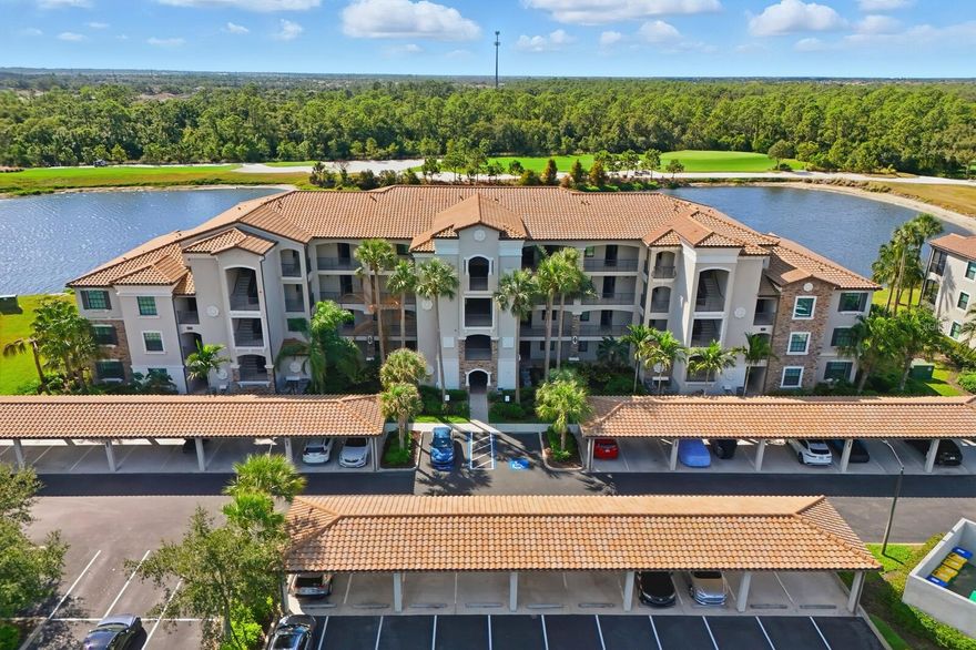 Come get your luxurious permanent vacation on at Lakewood National Golf Club, an Arnold Palmer designed championship golf course and luxury resort community! This 2 bedroom condo is great for long-term or for a quick vacation for all types of vacationers: Golfing, lounging by the pool with a cocktail, playing tennis, relaxing on your lanai overlooking the water, enjoying a spa treatment, taking a fitness class, playing tennis or pickle ball, or meeting up with friends for 19-hole drinks. UPGRADES & SPECIAL FEATURES ARE No carpets with LVP flooring in the bedrooms and new upgraded baseboards, tile flooring everywhere else, crown moulding, added fans, freshly painted interiors, seamless glass shower door, upgraded shower heads, impact glass windows, new A/C (2024) with transferrable warranty, water view, one covered parking space, and storage closet just outside the front door. Kitchen features include stainless appliances, granite countertops, upgraded faucet, closet pantry, and privacy film on the kitchen window for extra lighting. Furniture is available for purchase. ** COMMUNITY INCLUDES: 36-Hole Arnold Palmer designed golf course, Tiki Bar, Grand Clubhouse, Restaurant, Resort style zero entry swimming pool with lap lanes and heated spa, Smaller satellite pools throughout community, 8 lighted Har-Tru tennis courts + 1 tennis ball machine court with automatic ball retrieval system, 4 pickleball courts, 2 Har-Tru bocce courts, 24-Hour State-of-the-art fitness center, Onsite Fitness Director and TPI Certified Personal Trainer, Variety of group fitness classes to choose from, Full-service spa, Professionally managed homeowners association, Fully maintained lawns, Gated community with 24-hour security. ** LOCATION: Centrally located. A+ schools, LECOM, & Manatee Tech East Campus. Minutes to downtown Lakewood Ranch, Waterside downtown dining & recreation, Sarasota nightlife, Sarasota International Airport, the top-rated beaches in the country, UTC Shopping.