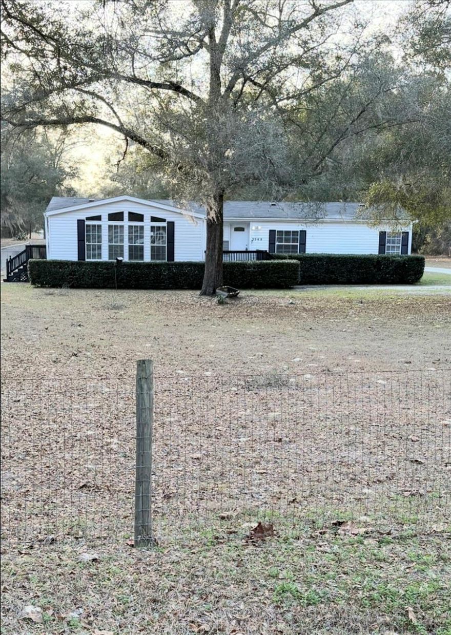 Welcome home to this completely updated, Oversized Triple-Wide featuring 3 bedrooms, 2 full bathrooms, a Dining/Living room combo with an additional large Great-Room. This home boasts a total structure area of 2,149sqft, and is situated on 1 full acre! It has been completely updated and remodeled inside and out! The updated features include: A New AC installed in 2026, Newer appliances, New bottom cabinets in Kitchen, New Vanities in both bathrooms (and a new garden tub in the master bathroom), New laminate flooring throughout the entire home and Epoxy kitchen counters. In the backyard, enjoy your oversized, above ground pool, featuring brand new vinyl lining to be installed. Don't wait, Don't miss out! Call today to schedule your showing!