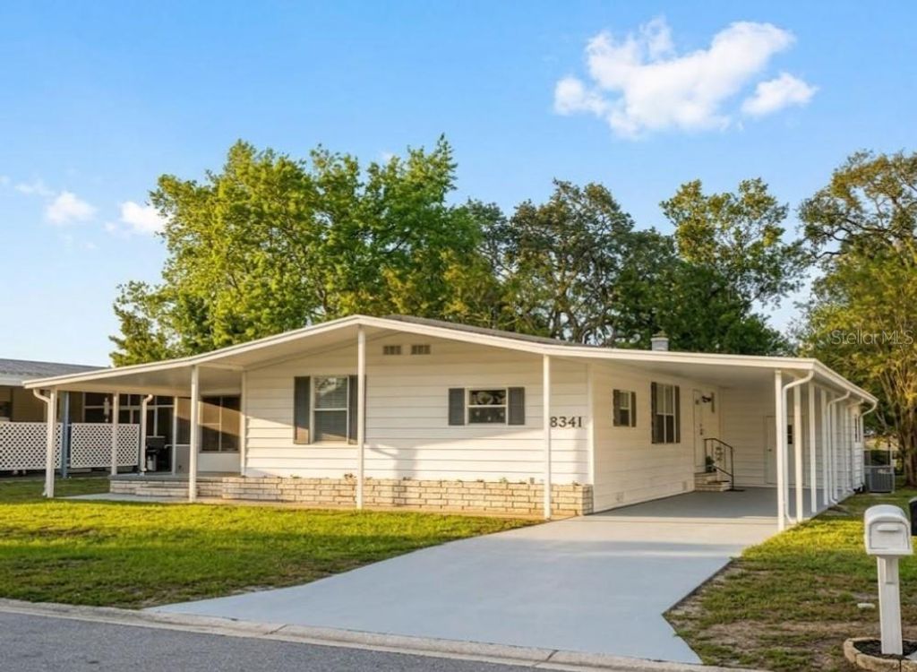 Photo of 8341 Highpoint Boulevard, Brooksville, FL 34613 (MLS # O6392256)