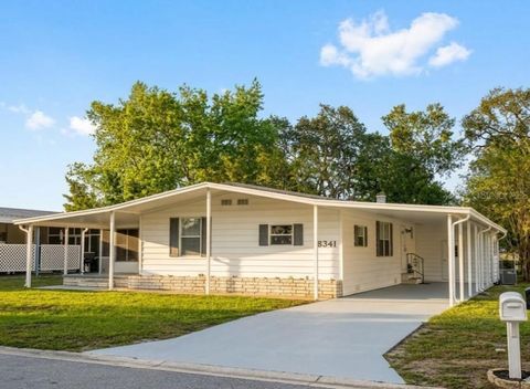 Photo of 8341 Highpoint Boulevard, Brooksville, FL 34613 (MLS # O6392256)