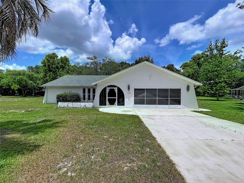 Photo of 12302 Deep Creek Dr, Spring Hill, FL 34609 (MLS # W7887048)