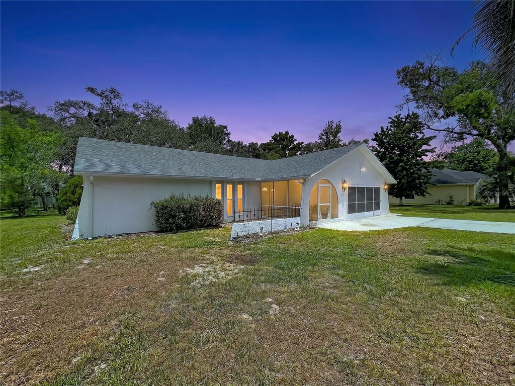 Photo of 12302 Deep Creek Dr, Spring Hill, FL 34609 (MLS # W7887048)