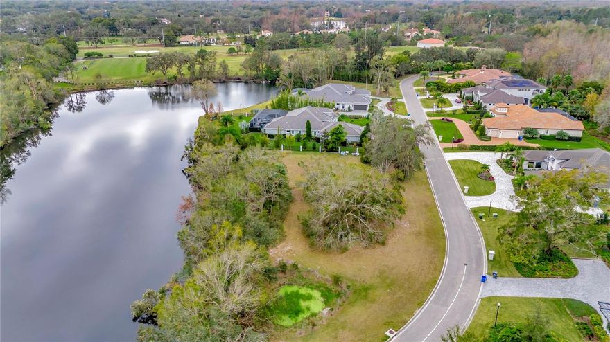 This premier homesite is located within the sought-after gated community of Avila Golf and Country Club.  This beautiful lot is .74 acres and features 177 ft of water views.  Located in a private enclave of Avila with only 31 homes, you are a 1-minute golf cart ride to the Golf Course and Country Club with its dining, fitness center, tennis and pool.  Don't miss this opportunity to build your custom, luxury home.