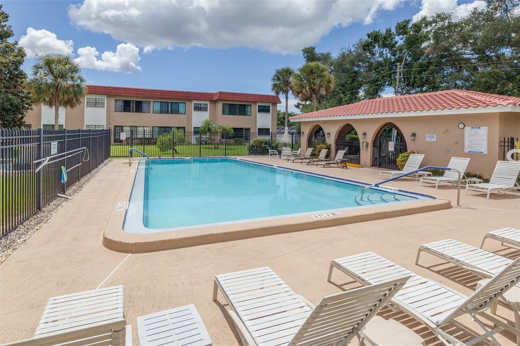 Photo of 1750 Belleair Forest Drive #A8, Belleair, FL 33756 (MLS # TB8545292)