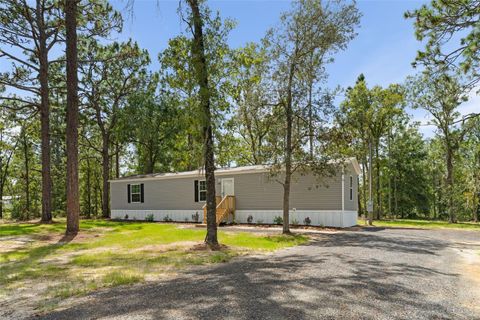 Photo of 5350 NE 108 Terrace, Bronson, FL 32621 (MLS # GC533687)