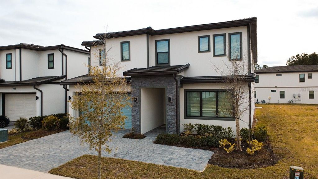 Photo of 1295 Butterfly Orchid Rd, Davenport, FL 33837 (MLS # S5142098)