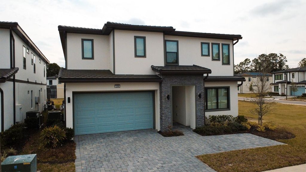 Photo of 1295 Butterfly Orchid Rd, Davenport, FL 33837 (MLS # S5142098)