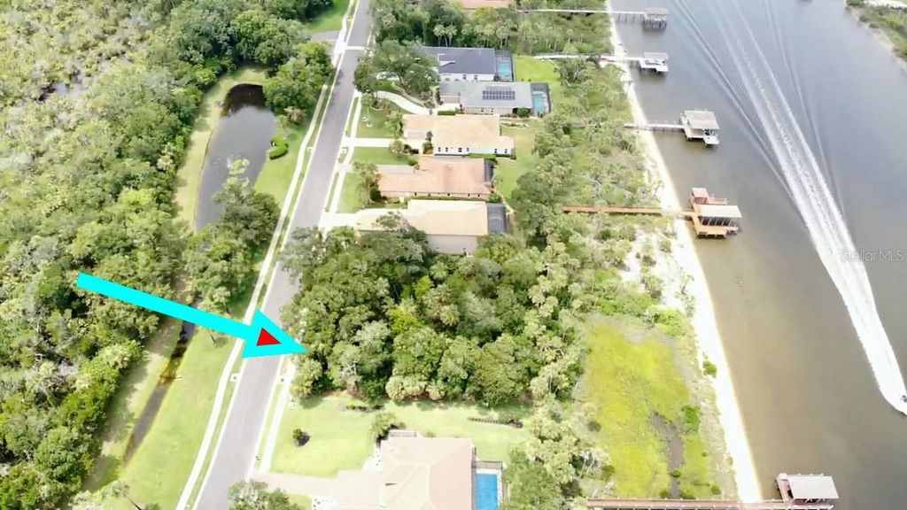 Photo of 63 S Riverwalk Drive, Palm Coast, FL 32137 (MLS # FC310977)