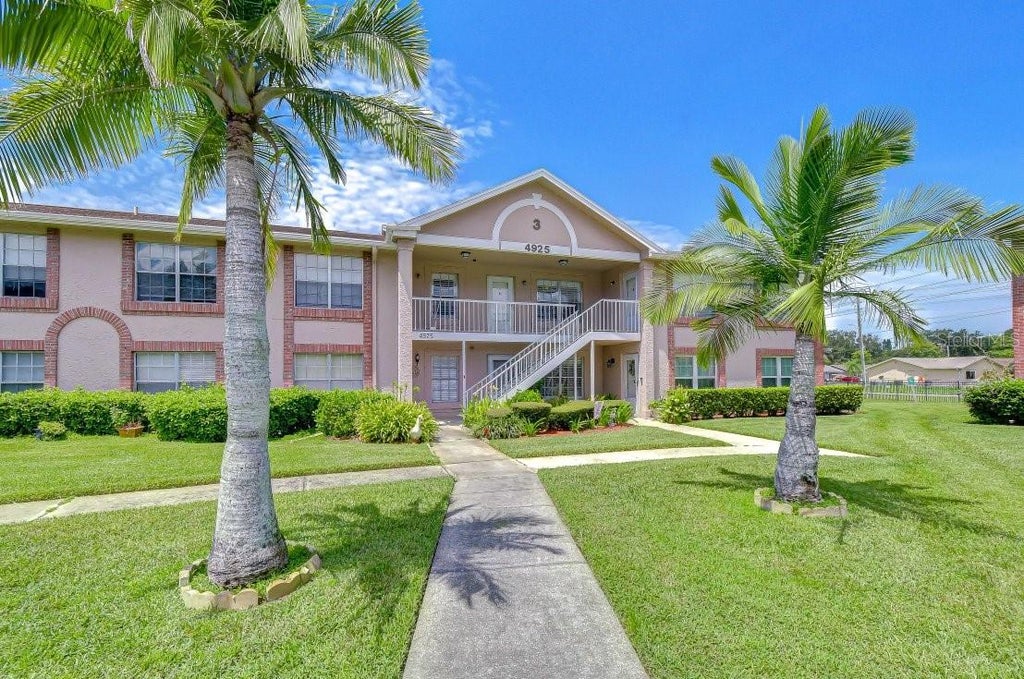 Photo of 4925 Myrtle Oak Drive #25, New Port Richey, FL 34653 (MLS # TB8542875)