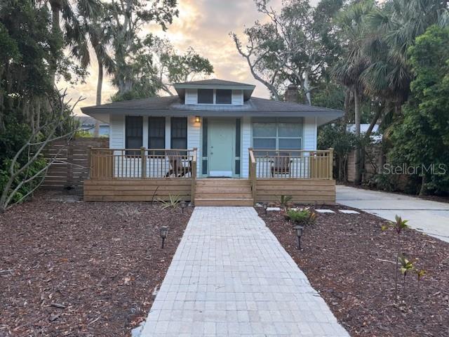 Location, Location, Location. Bayshore Beauty: Modernized bungalow, 2BR with Outdoor Oasis.
Discover this modernized 2-bedroom, 1-bath gem on pristine Bay Shore Road, where location truly is everything. Just steps from spectacular Sarasota Bay views, you'll find park benches perfect for soaking in the waterfront scenery. This updated home features new appliances throughout and a freshly built front deck and an entertainment-ready backyard ideal for hosting gatherings or enjoying quiet evenings outdoors. The property includes a convenient storage garage for all your extras. Enjoy the walkable lifestyle with restaurants, Starbucks, Dunkin' Donuts and numerous other amenities just minutes away by foot. Experience the perfect blend of updated interiors, outdoor living space, and an unbeatable location in this must-see property.