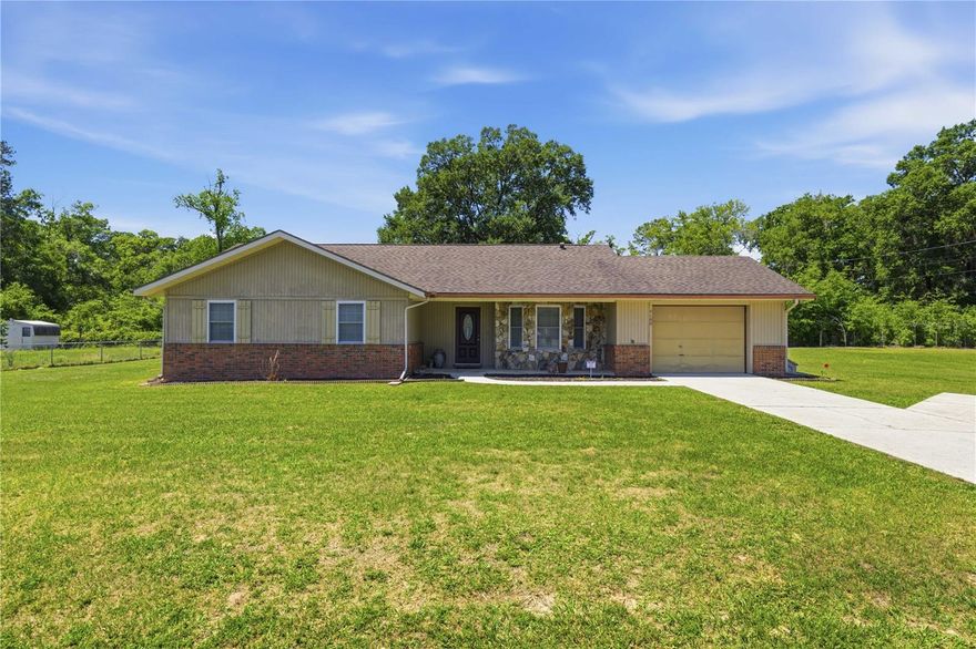Just in time for summer! Welcome to your private slice of paradise in NE Ocala! This beautifully maintained 3-bedroom, 2-bath POOL home sits on a spacious .37-acre lot with no HOA, offering both freedom and functionality.  Step inside to find new flooring throughout and a thoughtfully updated kitchen (2017) featuring new stainless-steel appliances, granite countertops and backsplash, and new cabinets. The home offers both a cozy breakfast area and a formal dining space, giving you flexibility for any lifestyle. Recent upgrades also include brand new windows installed in 2024. The primary suite is generously sized, complete with a walk-in closet.  This home is also equipped with a Kinetico whole-home water softener and filtration system, along with a dedicated under-sink drinking water system, providing high-quality water throughout the home.  Outdoors is where this home truly shines—enjoy Florida living at its finest with a screen-enclosed pool that was resurfaced in 2016 along with the surrounding pool deck, creating a fresh and inviting space to relax or host guests. The detached 1 car garage/workshop is ideal for hobbies, storage, or extra workspace. Freshly painted in recent years and move-in ready, this home offers the perfect blend of comfort, updates, and outdoor living—all in a desirable NE Ocala location.  Conveniently located near shopping, dining, medical facilities and everyday essentials, this home is just a short drive to downtown Ocala, where you’ll find local restaurants, boutiques, and events. Enjoy nearby outdoor adventures at Silver Springs State Park, known for its crystal-clear waters and glass-bottom boat tours, or take advantage of Ocala’s world-famous equestrian scene at the World Equestrian Center. Easy access to major roadways makes commuting a breeze while still enjoying the peace and space of a residential neighborhood.  Call today to schedule your private showing!
