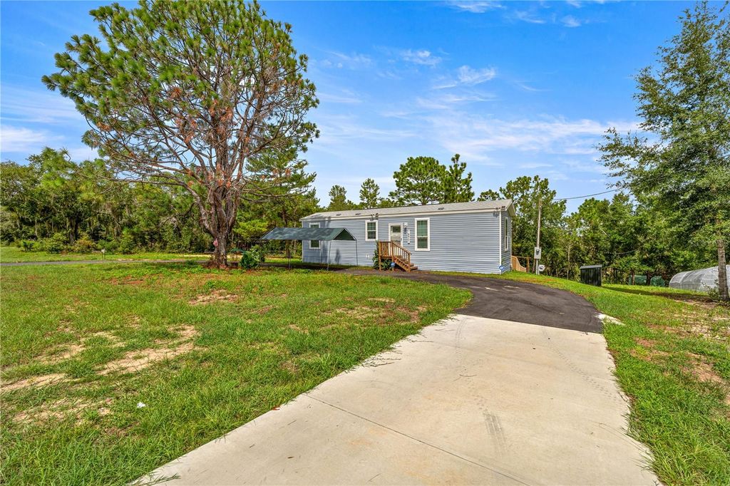 Photo of 15901 SE 113 St Rd, Ocklawaha, FL 32179 (MLS # O6342571)