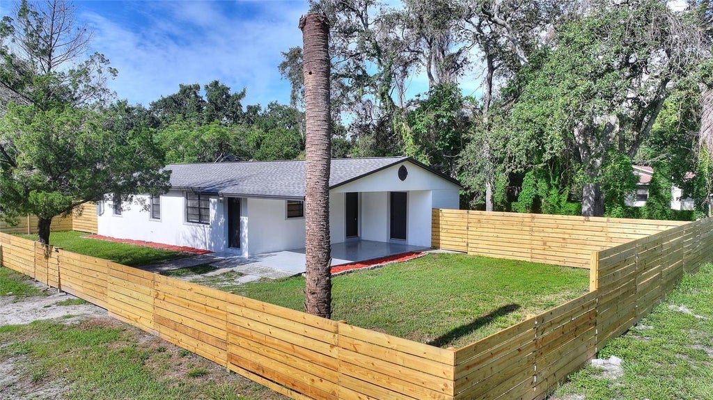 Photo of 10016 N 10th Street, Tampa, FL 33612 (MLS # TB8539045)