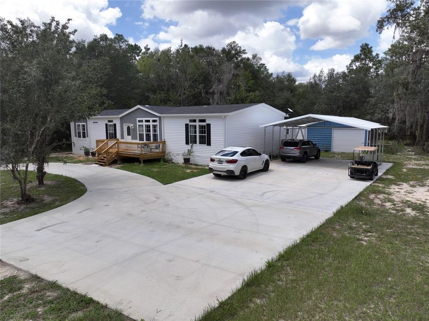 OWNER FINANCING AVAILABLE! 3.75%-4% rate! Welcome to your perfect retreat! This brand new 2176 sqft, 3-bed, 2-bath Jacobson 2023 Manufactured home sits on a double lot spanning 1.15 acres, offering ample space to fulfill your dreams. 9-foot ceilings with crown molding add a touch of elegance to the home. The chef's kitchen boasts an oversized island, smart stainless-steel appliances, gas range, and a fabulous pantry. Indulge in the upgraded master bath with custom walk-in closet. Premium Mohawk waterproof white oak laminate flooring, and quartz countertops. The bonus room with wet bar adapts to your needs. Stay connected with Starlink high-speed internet. Includes, 20x30 storage building with roll up door, 2-car carport, and new concrete driveway. Enjoy access to COWPEN Lake through the $56 a year HOA fee. Located on a serene cul-de-sac, seize this chance to experience the epitome of modern living combined with nature's tranquility.