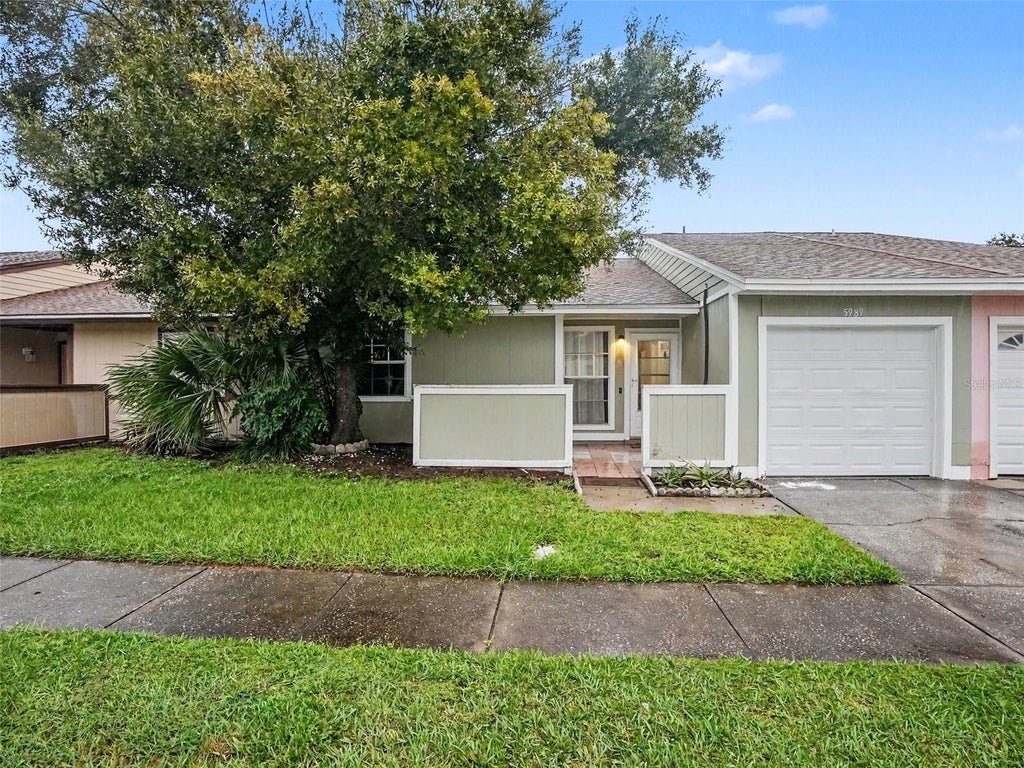 Photo of 5989 Talavera Street, Orlando, FL 32807 (MLS # O6448383)