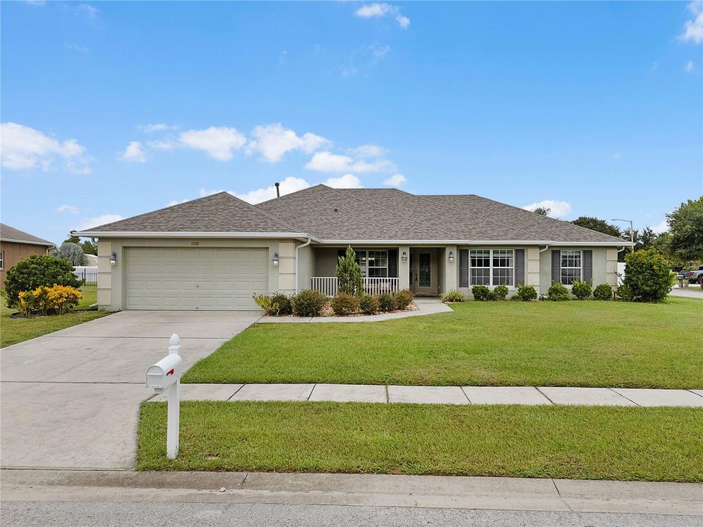 Photo of 1522 Blue Sky Boulevard, Haines City, FL 33844 (MLS # O6349740)
