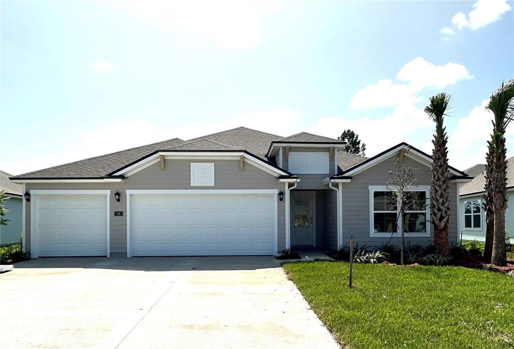Photo of 56 Hulett Woods Road, Palm Coast, FL 32137 (MLS # FC294748)