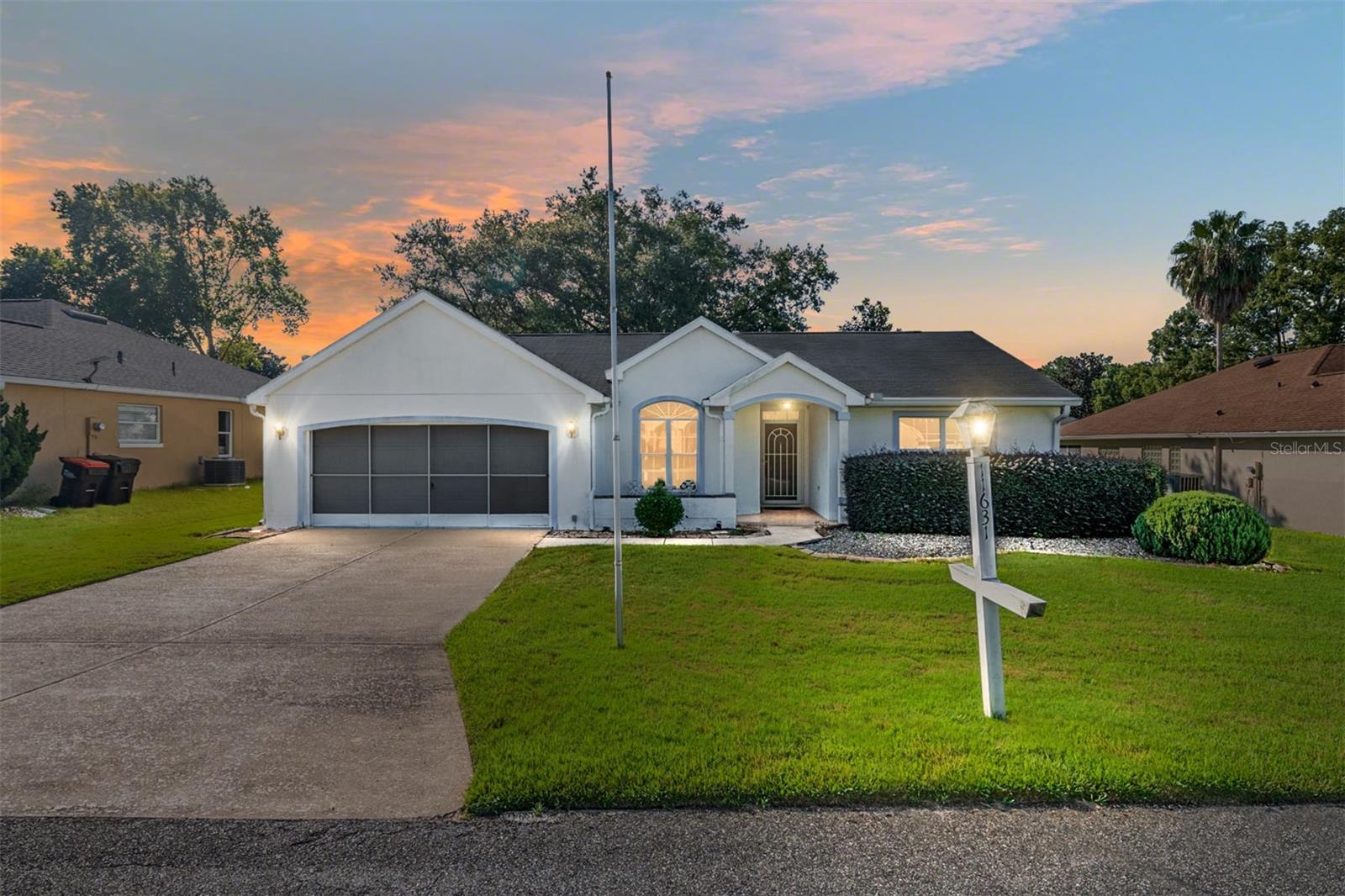This charming 2-bedroom, 2-bathroom home features a desirable split layout and spacious 2-car garage. Inside, you’ll find luxury vinyl and tile flooring throughout most of the home, creating a clean and low-maintenance living space. The kitchen boasts crisp light cabinetry with plenty of storage and counter space, perfect for cooking and entertaining, while the main bathroom boasts a beautifully updated walk-in shower. Additional features include a Florida sunroom perfect for relaxing, a 2014 roof, and a 2012 AC. With a little TLC and updating, this home can truly shine. Residents of this community enjoy access to numerous amenities with six pools ( 1 indoor ), 5 Hot tubs - spanning across three different club houses! But it doesn't stop there.. Over a 150 clubs to join, two recently updated workout centers, Enjoy meals at the on-site restaurant or hit the greens at the community golf course. Plus, there's a dedicated dog park for your furry friends. This community ensures an active and fulfilling lifestyle. Don’t miss out on this opportunity to make this home yours!