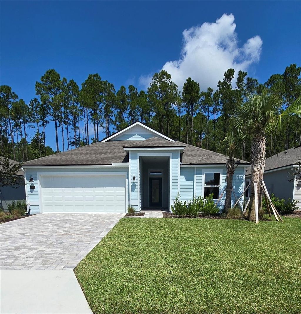 Photo of 155 Greenwood Drive, Palm Coast, FL 32137 (MLS # FC309799)