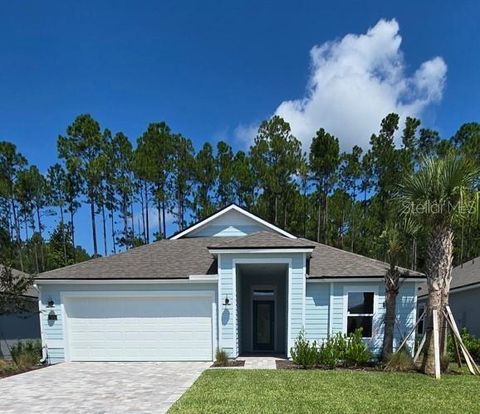 Photo of 155 Greenwood Drive, Palm Coast, FL 32137 (MLS # FC309799)