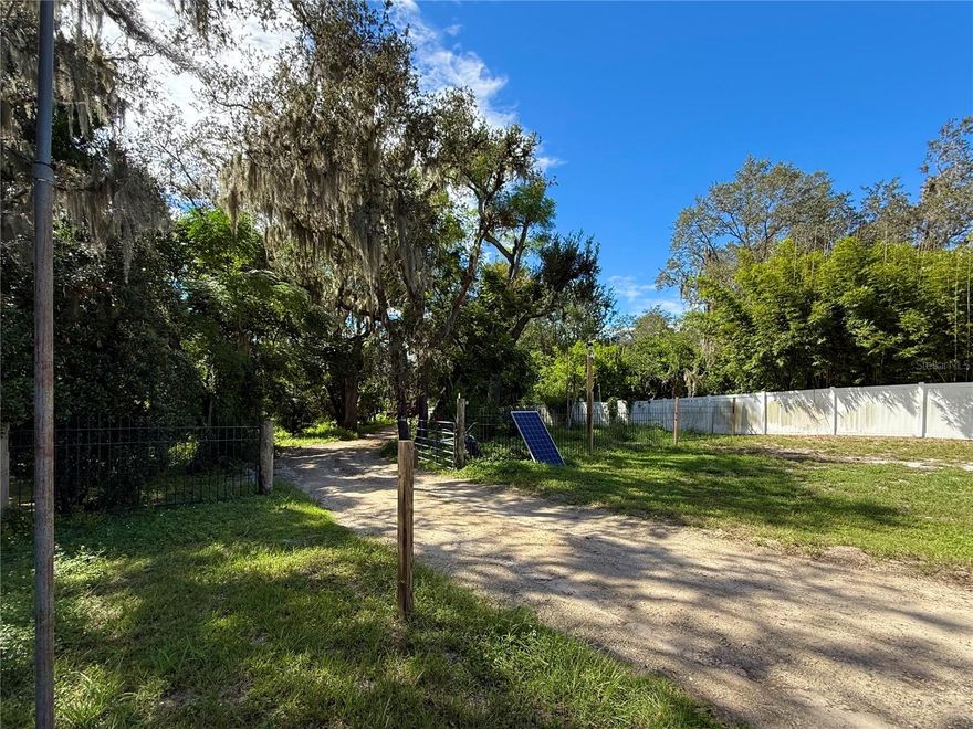 Two parcels being sold together in Mount Dora, ideal for families or multi-generational living. The 2017 manufacture home sits on 2.64 acres and the adjoining parcel facing Branch Ave. is .39 acre for a total of 3.03. The is no HOA so it gives you the freedom to roam with plenty of privacy all around. The property is ideal for families or multi-generational living. You can park your work truck, RV and boat and be close to Mount Dora, Eustis, and Tavares and enjoy everything the "Golden Triangle" has. The historic downtown is less than three miles away and it is filled with antique shops, boutiques and vintage stores. You would enter on Lot 6 Norman Dr. Mount Dora, Fl 32757 on Branch Ave. SURVEY AVAILABLE for the 2.64 acres. The Lot 6 is 75 X 210 X 82 X 245. A unique property to own.