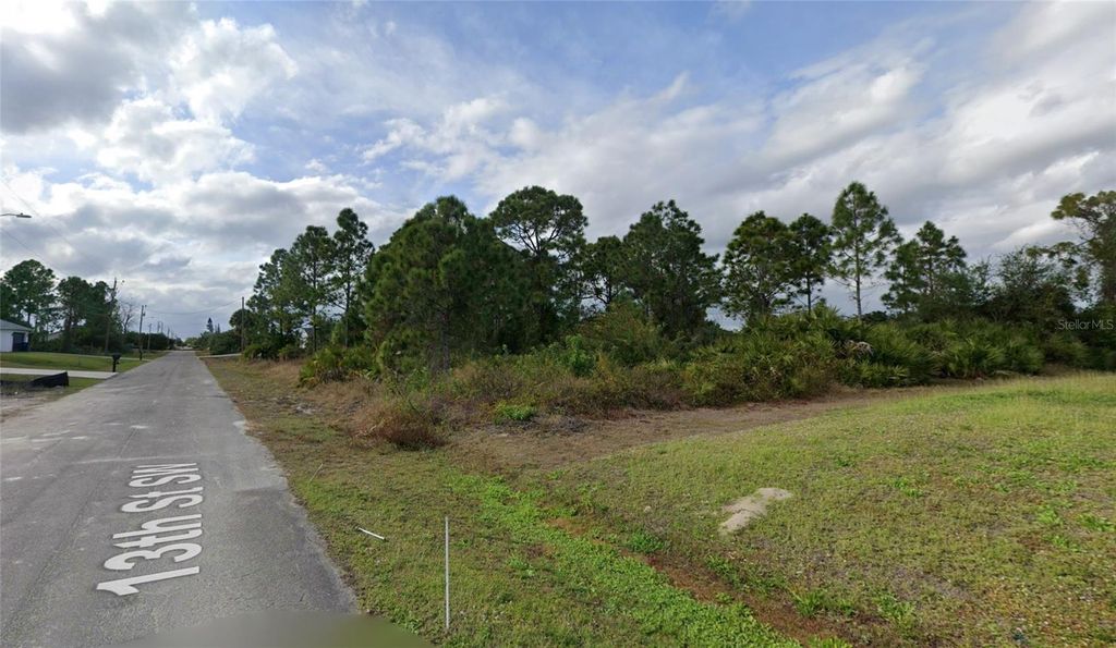 Photo of 3412 13th Street SW, Lehigh Acres, FL 33976 (MLS # O6397558)