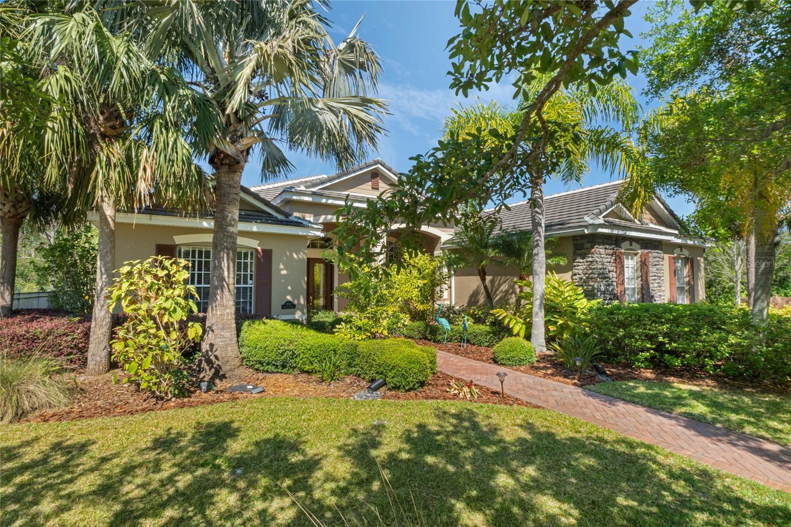 LUXURY CUSTOM POOL HOME! 4BED/3 BATH/3 CAR GARAGE – HOME ON A CUL-DE-SAC IN LOCH LEVEN - EXCLUSIVE GATED COMMUNITY - LAKE ACCESS. This stunning property blends luxury, comfort, and natural beauty, set on a peaceful cul-de-sac. Situated on a 0.45-acre lot with picturesque Pond views, the Home features beautiful high ceilings and a versatile floor plan, accommodating both daily living and special occasions. The Formal Dining Room and expansive Living Room welcome you into a grand entrance. The Open-Concept Kitchen and Family Room, with a cozy Fireplace, make an ideal space to relax. The kitchen offers a gas cooktop, pantry, prep-island, and dine-in space. The Split-Bedroom Layout provides privacy, with a Spacious Primary Suite offering a tranquil retreat with access to the pool/patio area. The en-suite bathroom includes dual vanities, a walk-in shower, and a jetted soaking tub, accompanied by two substantial walk-in closets. French Doors from the Primary Bedroom and Family Room present seamless access to the pool and relaxing outdoor patio area. This Home also has an Office Area with access from the foyer. Additional features include a sizeable laundry room with cabinetry, ample storage closets, a Gym space, and a 3-car garage for vehicles and tools. Outside, the lanai provides a Fully Enclosed Screened-in Heated Pool and Spa, surrounded by a large yard with fruit trees, palms and tropical plants . A Prime Feature of this home is LOCATION. It is on a quiet cul-de-sac, with no neighbors on two sides, protected by a vast stand of trees and a natural pond - a Nature/Bird Lovers Paradise!
HOA/COMMUNITY: As a resident of this Premier Gated Community, you’ll enjoy LAKE ACCESS from a Private Boat Ramp with a new Dock, perfect for exploring the pristine spring-fed lake surrounded by lush trees. Whether boating, fishing, kayaking or soaking in the serene surroundings, this neighborhood offers endless opportunities. There are also Tennis/Pickle-ball Courts, a Playground, Picnic Pavilion, Basketball, and a Conservation Area – even an RV/Boat Storage area! Loch Leven is centered on a 169-Acre Spring-Fed Lake, just minutes from the best Shopping, Spas, Charming Boutiques, Fine Dining, Cafés, Art Galleries, Festivals and more in Mount Dora and the surrounding area. Additionally, you’ll enjoy quick access to major highways 441, 46 and FL Toll Roads, making your travels throughout Central Florida a bit easier. If living a Resort-Type Lifestyle in a Prime Location and a Safe Neighborhood is what you’re looking for, it’s all here! Schedule Your Appointment Today!