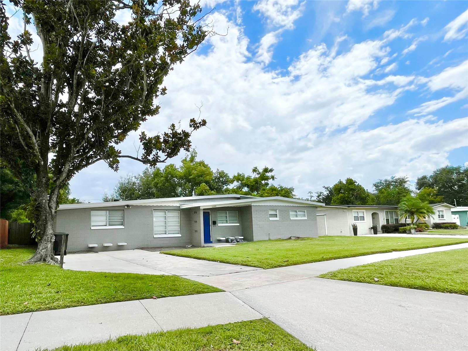 Beautiful Mid-century Modern, concrete block home with newer roof and all electrical panels and outlets updated, re-piped, updated bathroom vanities and fixtures. All bedrooms have new laminate flooring, built in or walk in closets. Interior doors have been replaced, both interior and exterior has been painted, and ceramic tiles cleaned. The oversized bonus room and family room (with closet) could be turned into a nice size in-law suite or 4th bedroom. A large fenced in backyard welcomes you with plenty of room for a pool or expanded patio for entertaining. Across the street is Englewood Park, in the heart of Orlando with beautiful green spaces, shade trees, a playground and sidewalks. This well-maintained home is "Move in Ready!" Located near the 408 and 417- with easy access to downtown Orlando, The Sanford and Orlando International Airports, and close to all public schools including UCF and Valencia Colleges. CALL for your showing appointment today.