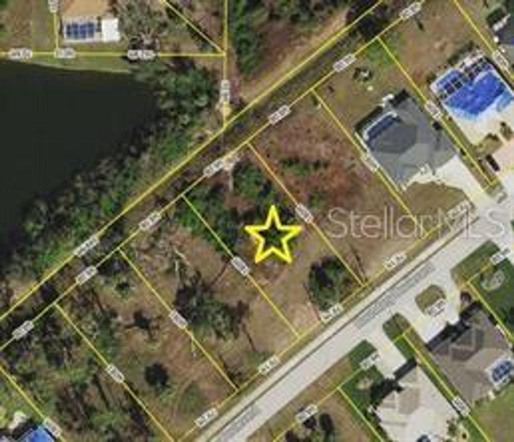 Photo of 419 Boundary Boulevard, Rotonda West, FL 33947 (MLS # D6144744)