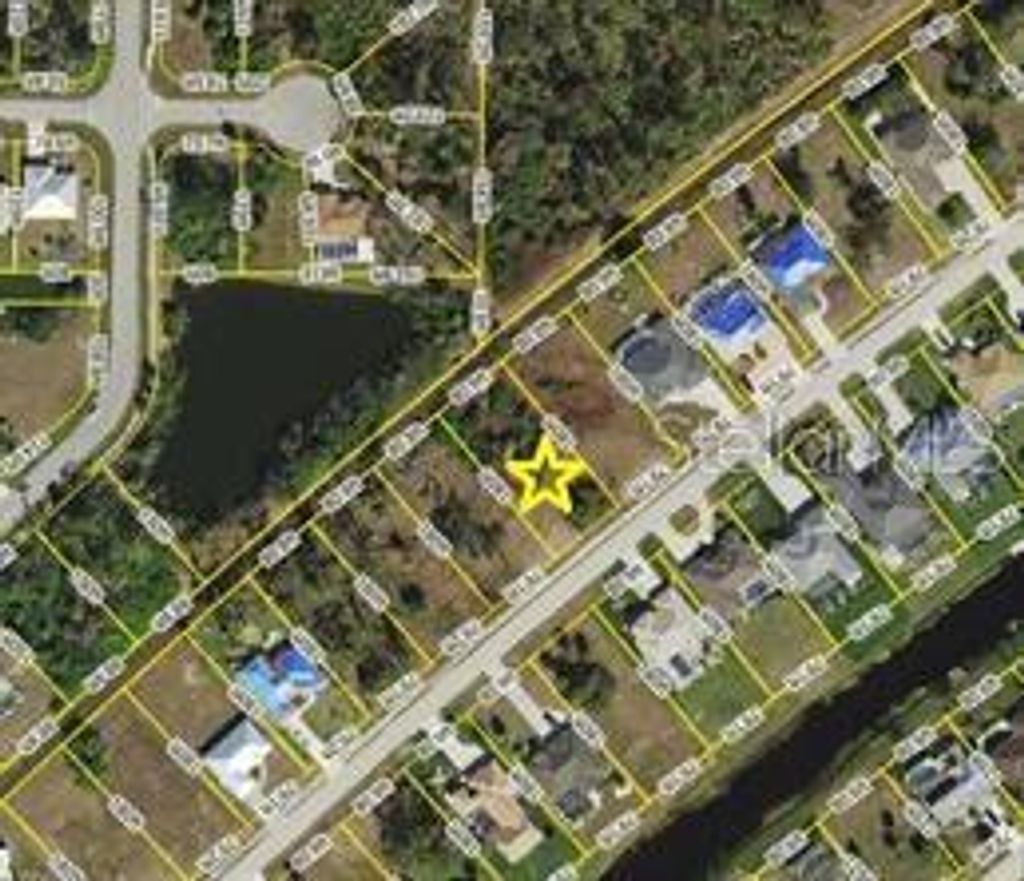 Photo of 419 Boundary Boulevard, Rotonda West, FL 33947 (MLS # D6144744)