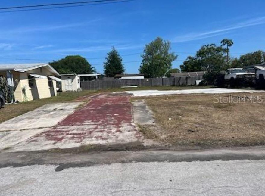 Explore the possibilities with this prime vacant lot in the Grove Park neighborhood of New Port Richey. Tucked away on a quiet, paved street, this property offers a rare chance to build in a well - established area with NO HOA restrictions. Enjoy close proximity to local shops, restaurants, medical centers, and the scenic Gulf Coast. With convenient access to major roadways and a short drive to the Tampa Airport, this location blends everyday ease with coastal charm. Whether you're planning a custom build or seeking a smart investment.