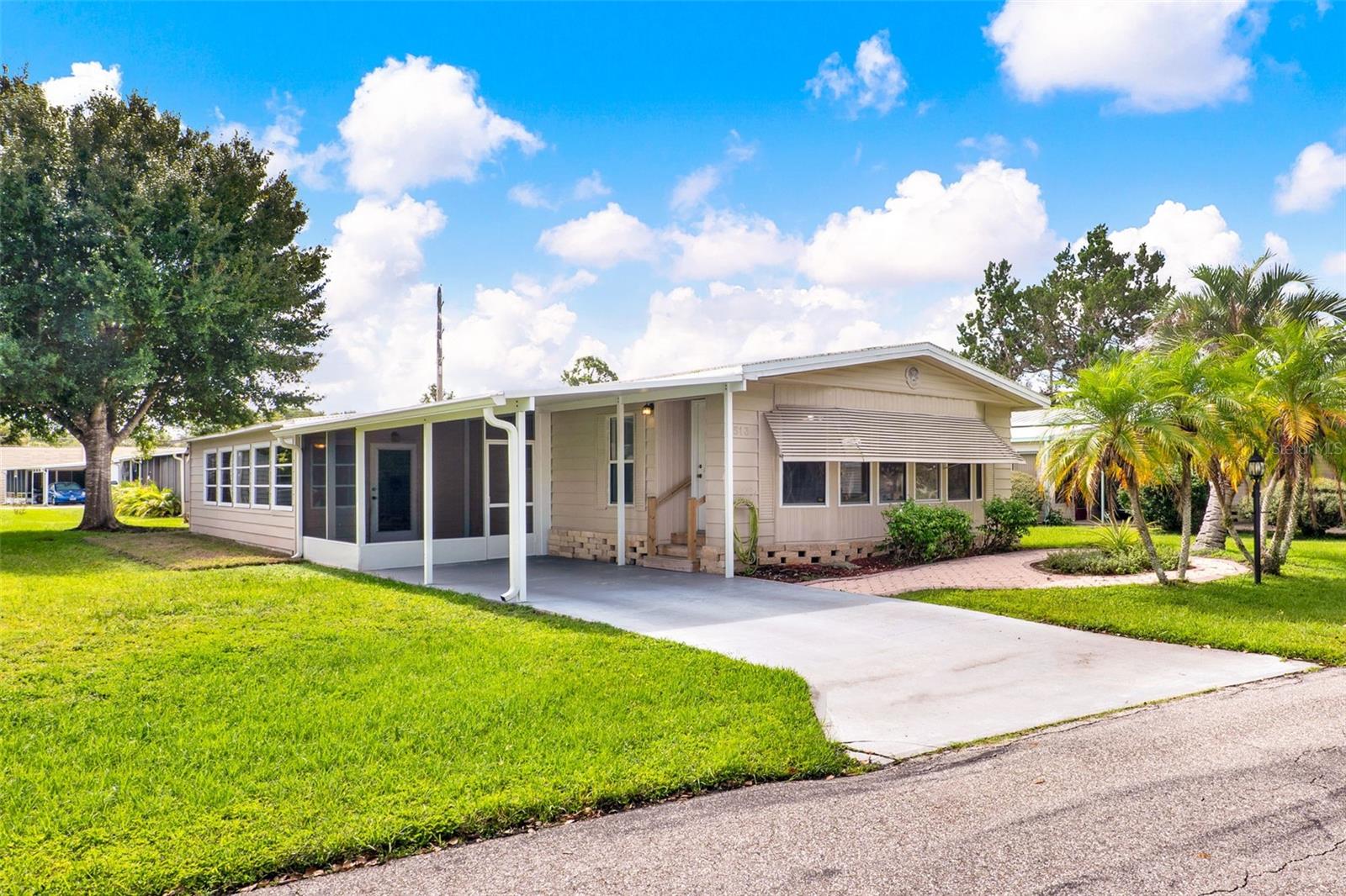 513 Flamingo is a must see. This Large 2 bedroom 2 bathroom home has been completely remodeled; Offering over 1600 sqft of living space featuring New Flooring, New Roof, Added Screen Porch, Enclosed Sunroom under heat and air adding additional living space. Great for a Craft Room, Game Room, Office. Updated Kitchen is bright and spacious, leaving plenty of space for an eat in breakfast room. Indoor Laundry room with Washer and Dryer. Newer Windows and Updated Bathrooms. Additional Storage perfect for your seasonal decorations. This home is ready to call home. Kove Estates is a vibrant 55+ Co-Op community, friendly active environment offering resort-style living in a gated Golf Course community. There is no lot rent, as a share in the community conveys with the sale. The monthly HOA $270. As a resident of The Kove Estate, you will enjoy free 9-hole golf, two pools (one heated), tennis courts, pickleball, community events, Clubhouse, Library, and gated security. The community is conveniently located off SR415, minutes to Sanford, Deltona, New Smyrna Beach, close to shopping, dining, medical facilities, and attractions such as the Daytona International Speedway, the Kennedy Space Center, and the Orlando theme parks. Perfect for anyone looking for a peaceful and convenient lifestyle. Call today to view! Come see this home today.