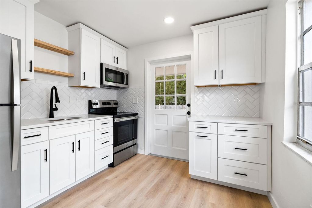 Photo of 1028 Bass Boulevard, Dunedin, FL 34698 (MLS # TB8490090)