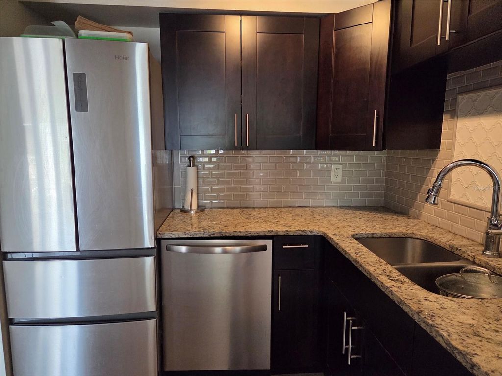 Photo of 4985 Cobia Drive SE #A, St Petersburg, FL 33705 (MLS # TB8398691)