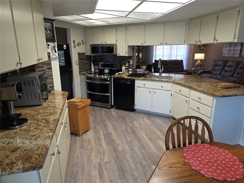 Photo of 24088 Eppley Drive, Brooksville, FL 34601 (MLS # W7886020)