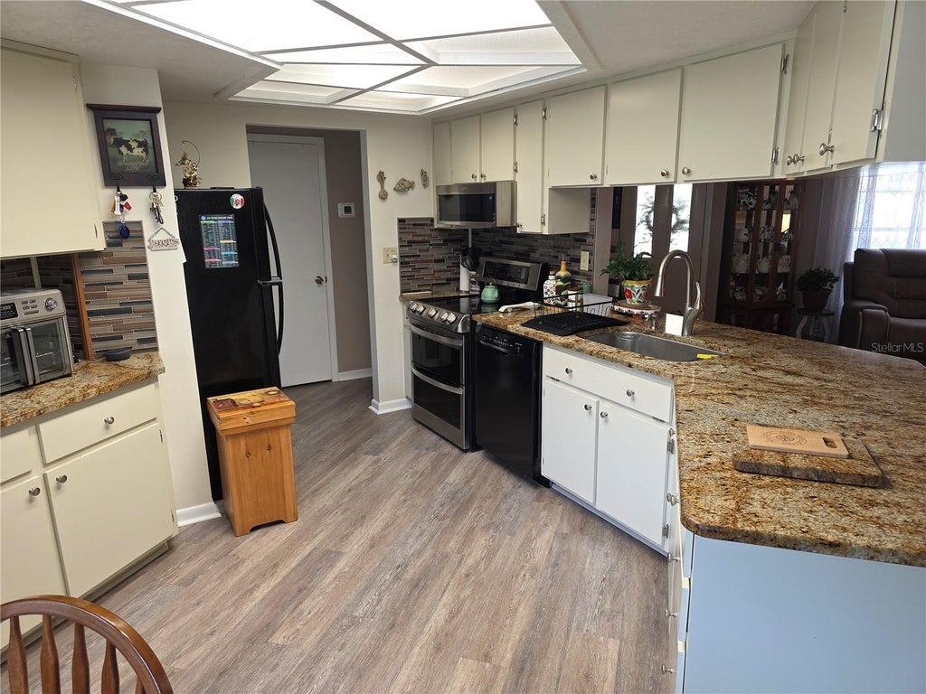 Photo of 24088 Eppley Drive, Brooksville, FL 34601 (MLS # W7886020)