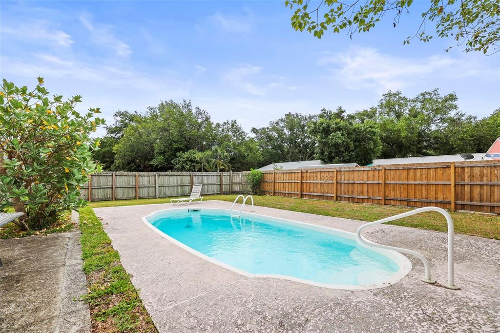 Photo of 1613 Greenwood Drive, Dunedin, FL 34698 (MLS # TB8508395)