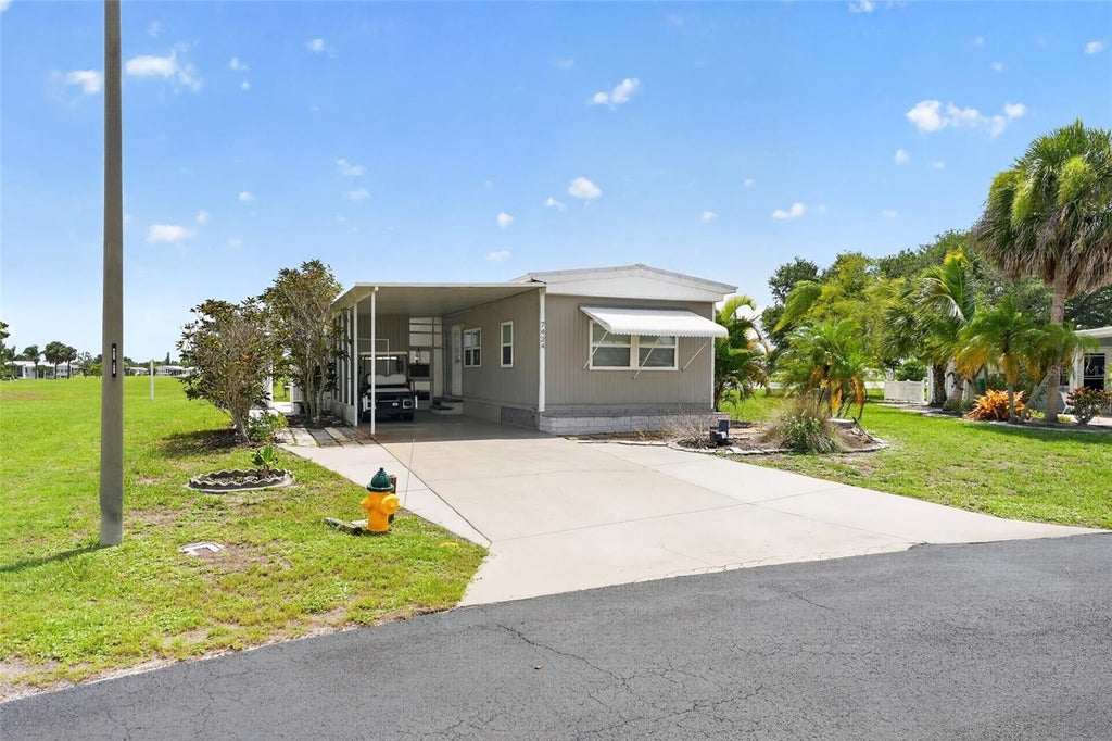 Photo of 7424 Widness Lane, Port Charlotte, FL 33981 (MLS # D6148186)