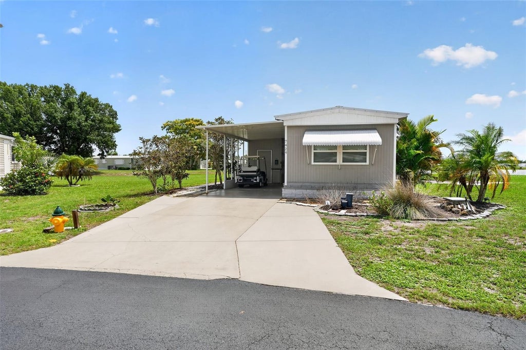 Photo of 7424 Widness Lane, Port Charlotte, FL 33981 (MLS # D6148186)