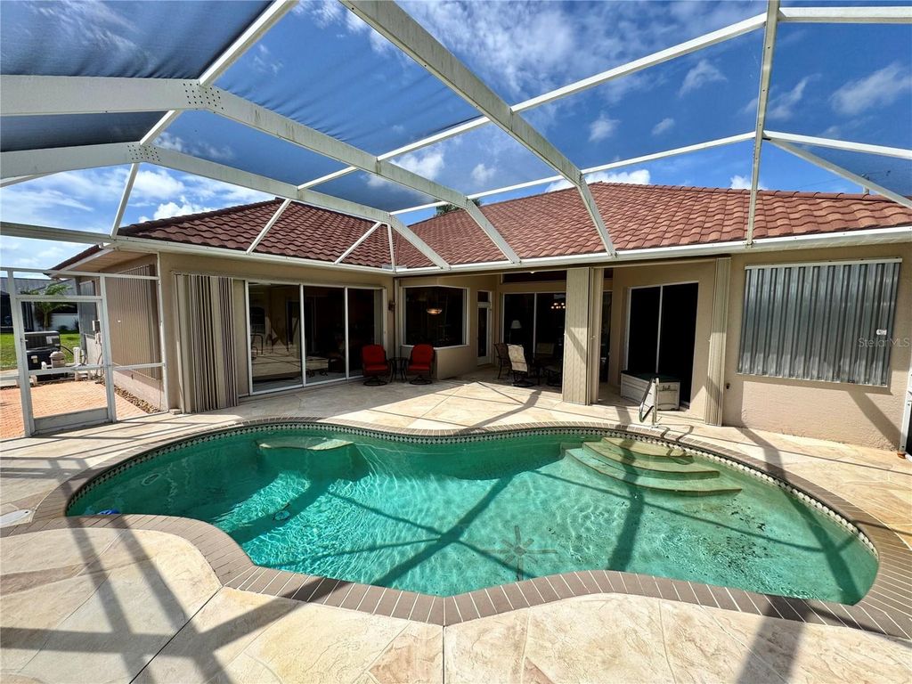 Photo of 9516 Miami Circle, Port Charlotte, FL 33981 (MLS # C7515655)
