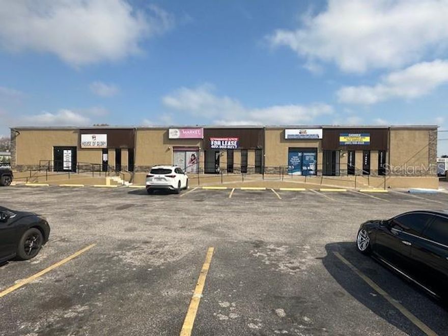 Mixed used commercial, freestanding brick building.