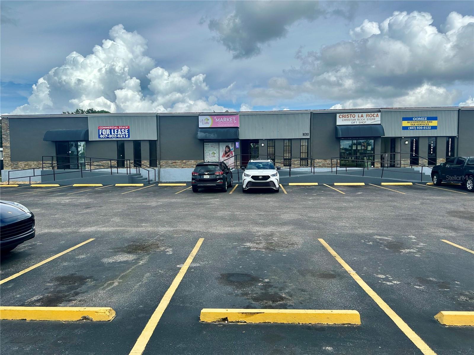 Mixed used commercial, freestanding brick building.