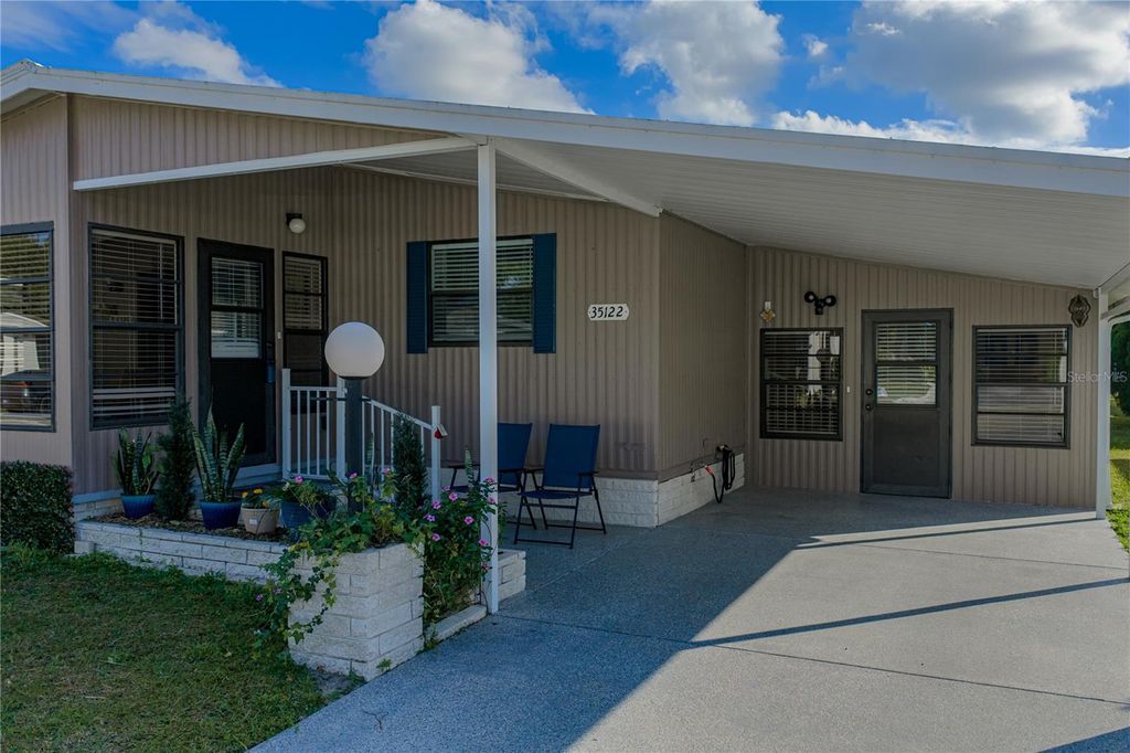 Photo of 35122 Mcculloughs Leap, Zephyrhills, FL 33541 (MLS # TB8459811)