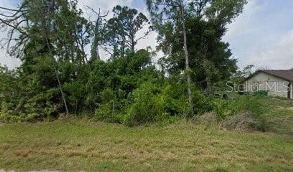 Photo of 5441 Burgner Street, Port Charlotte, FL 33981 (MLS # C7520940)