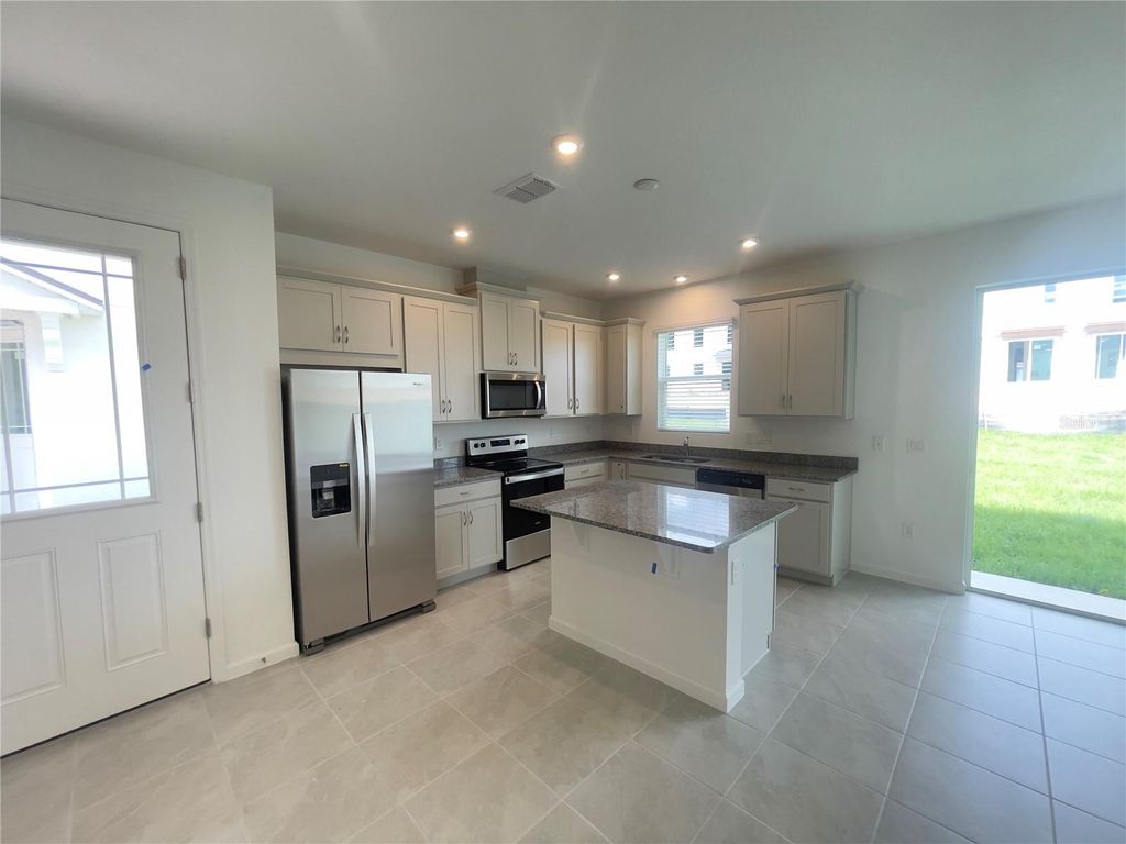Photo of 1150 Seaside Mist Trail, Kissimmee, FL 34747 (MLS # O6355936)