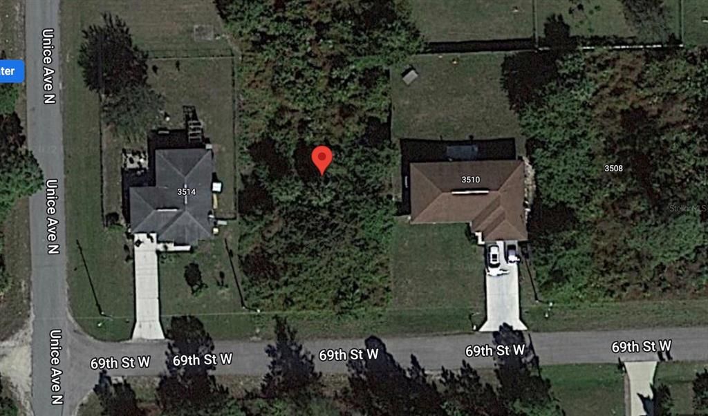 Photo of 3512 69th Street W, Lehigh Acres, FL 33971 (MLS # S5071159)