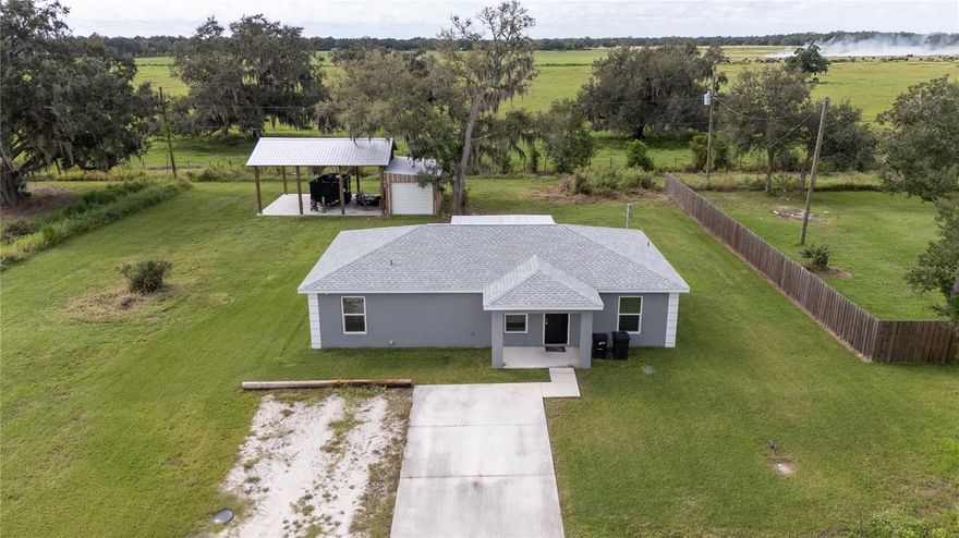 Welcome to your dream property nestled on a spacious half-acre lot in the heart of Desoto County! Built in 2022, this newer home offers the perfect blend of comfort, functionality, and outdoor living. Featuring 3 bedrooms and 2 bathrooms, this charming home offers a desirable split floor plan, with the primary suite separated from the other bedrooms, ideal for families, guests, or home office setups. Perfect for anyone looking for a fresh, move-in-ready space! The laundry room adds convenience and extra storage space, helping keep your living areas neat and organized. The kitchen features a spacious center island with built in cabinets and room for barstools to enjoy casual dining.  You'll love the sleek stainless steel appliances, soft-close drawers, and ample storage space that make cooking and hosting a breeze! Step outside to enjoy a recently enhanced and beautifully crafted back porch area, designed as the ideal spot to relax, entertain, and soak in the peaceful surroundings. For the hobbyist, entrepreneur, or anyone needing extra workspace, the property features a versatile 24X30 pole barn complete with an enclosed shop. The barn and shop are thoughtfully equipped with water hooked up and electric wiring, ready for easy connection to power making it a perfect space for projects, storage, or a workshop tailored to your needs. The shop even has an AC unit inside! Enjoy the tranquility of country living while being close to local amenities. Whether you're dreaming of quiet mornings, productive afternoons in your own workshop, or entertaining under the stars, you don't want to miss this unique opportunity to own a piece of beautiful land with endless possibilities! Schedule your private showing today and imagine the life you could build here!