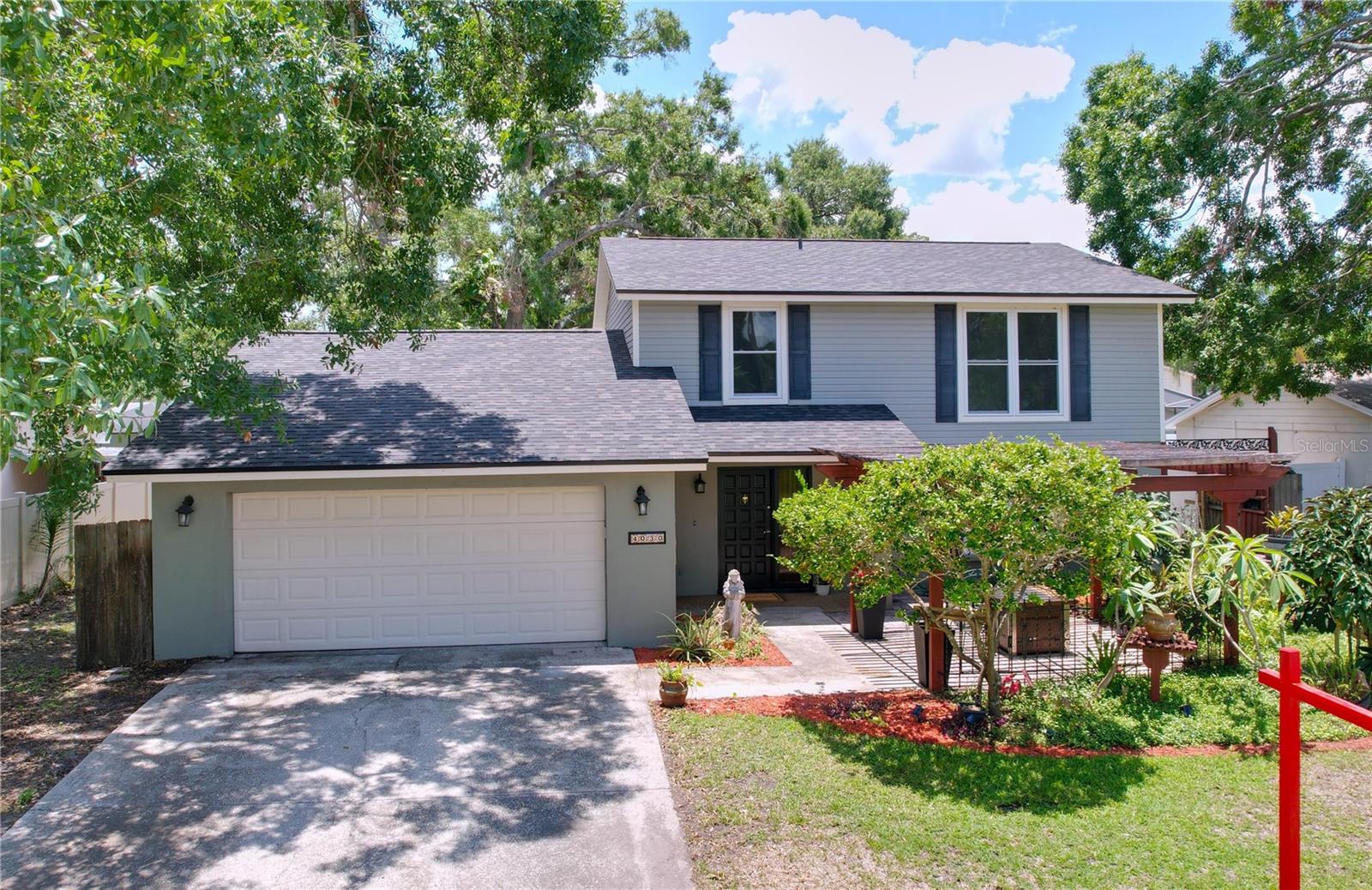 Northdale is a well-established and thriving northern suburb of Tampa. This sought after suburb is tucked away just far enough from the major roads providing peace and quiet. However, this property is practically walking distance to everything you could want. All major grocery stores are at your fingertips including Whole foods, Publix, Sam's Club, and much more. Step inside this 4 bedroom 2 and a half bathroom well-maintained two-story property. You will find an agreeable floor plan providing a space for most all furniture. The eat in kitchen has granite countertops/backsplash, a movable island, and plenty of storage in solid oak cabinets. Taking a step outside is a fully fenced in backyard oasis featuring a new deck (2025), 12 by 10 Tuff shed, covered and screened in lanai and mature landscaping. There is a new roof (2025), new carpet in bedrooms, fresh paint inside and out, newer windows and newer AC unit giving the potential buyer peace of mind and low cost of living. Schedule a showing today and come see this great move in ready option.