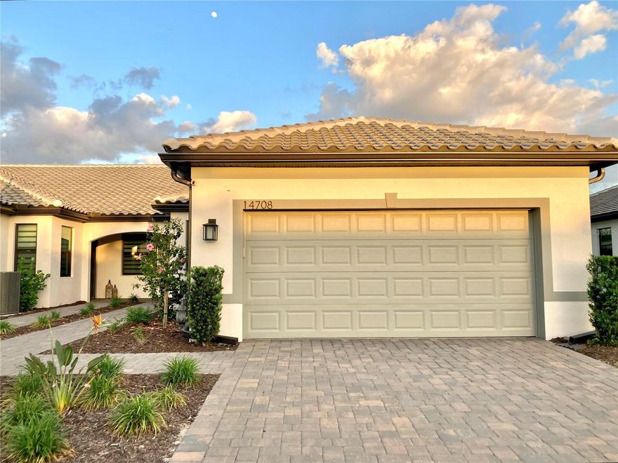 Make your appointment today to see this gorgeous Cascadia Model End Villa overlooking a beautiful lake in lovely Talon Preserve!  This Cascadia model includes two bedrooms, two baths with office/den on a premium lot with over $55k in upgrades.  Features of this stunning unit include hurricane impact doors and windows throughout, upgraded kitchen cabinets, countertops, and backsplash, upgraded  bath cabinets and countertops, upgraded shower tile with extension to ceiling in both bathrooms, upgraded lighting throughout, upgraded interior doors, upgraded baseboards, and soffit added in primary bedroom. This unit also features a built-in grill on the beautiful extended lanai with full screened cage. Talon Preserve residents have access to a grand clubhouse with a large community room for events, catering kitchen, social lounge, outdoor lounge, card-craft room and classic arcade room, State-of-the-art fitness center, performance training room and group fitness studio, 8 Pickleball courts, 2 Tennis courts, 4 Bocce courts, playground, firepit lounge, dog park, resort style pool, heated spa, splash pad, full-service restaurant bar & grill, and more! Don't miss this opportunity!